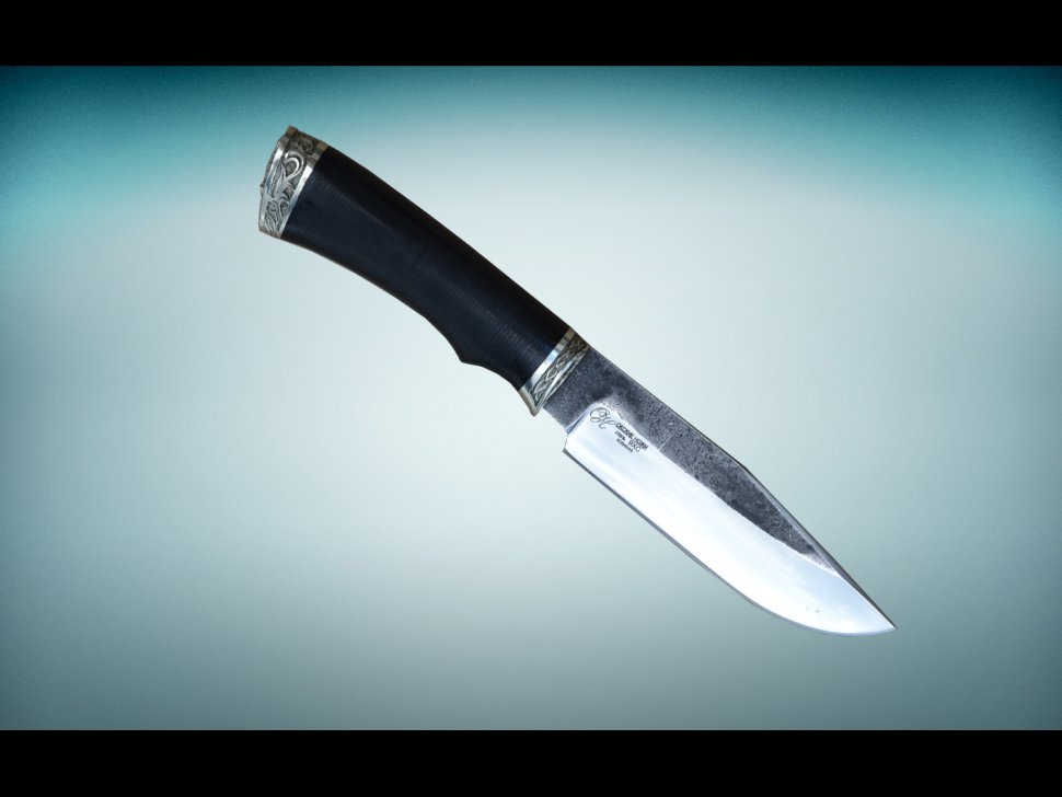 Нож Пума из стали 9ХС со следами ковки и с рукоятью из кожи